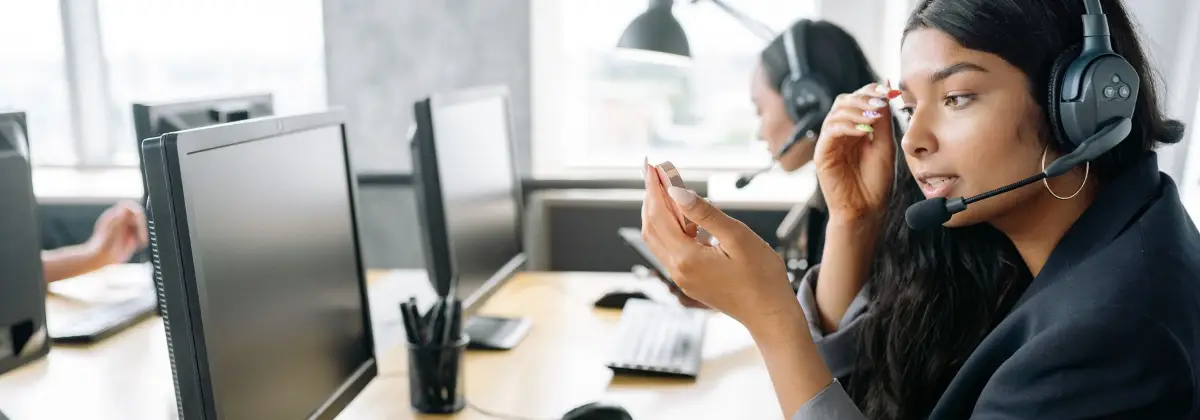 An admissions advisor on a call with a student